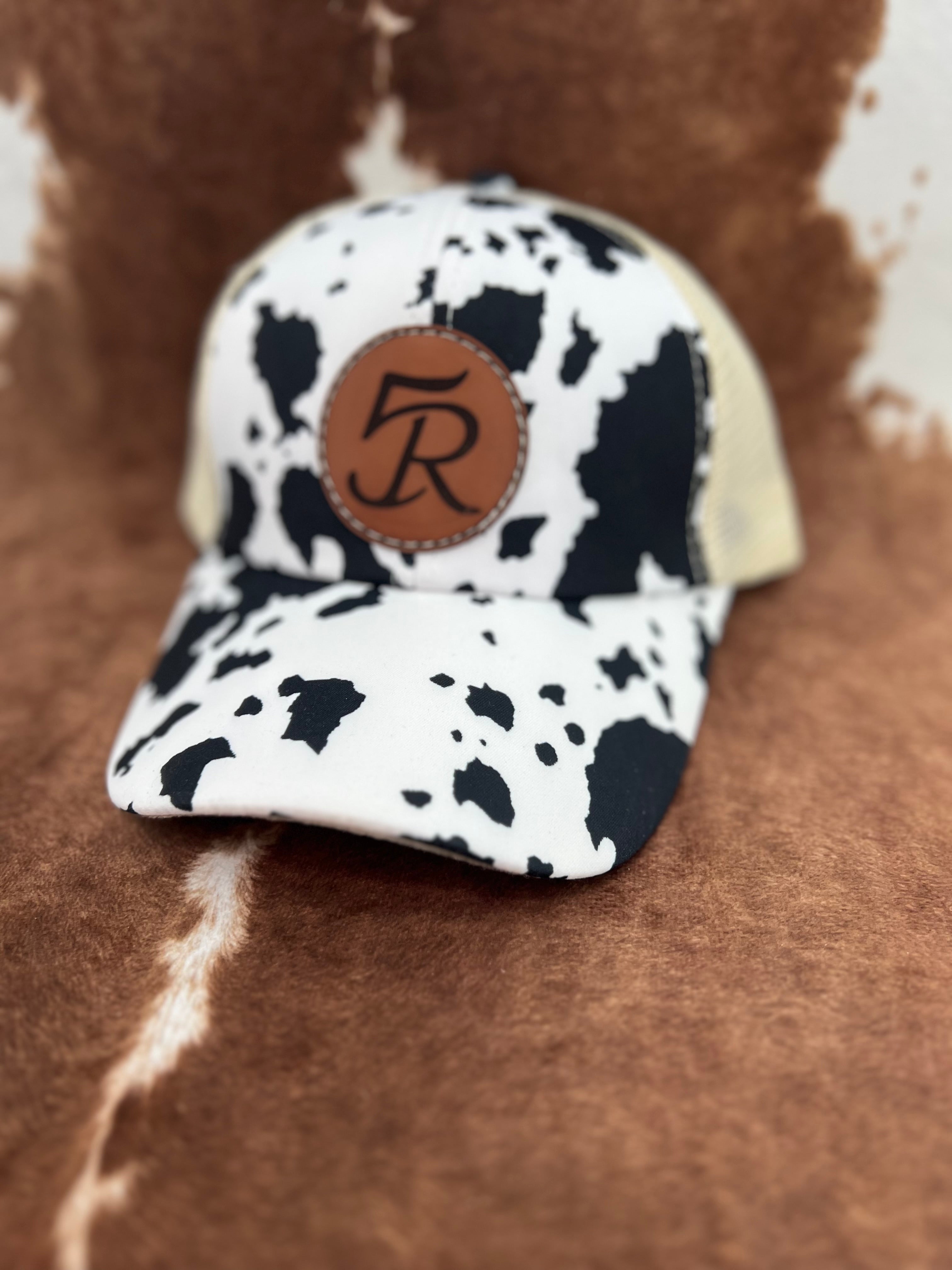 Statement Collection - Cow Print Khaki Crossed Pony